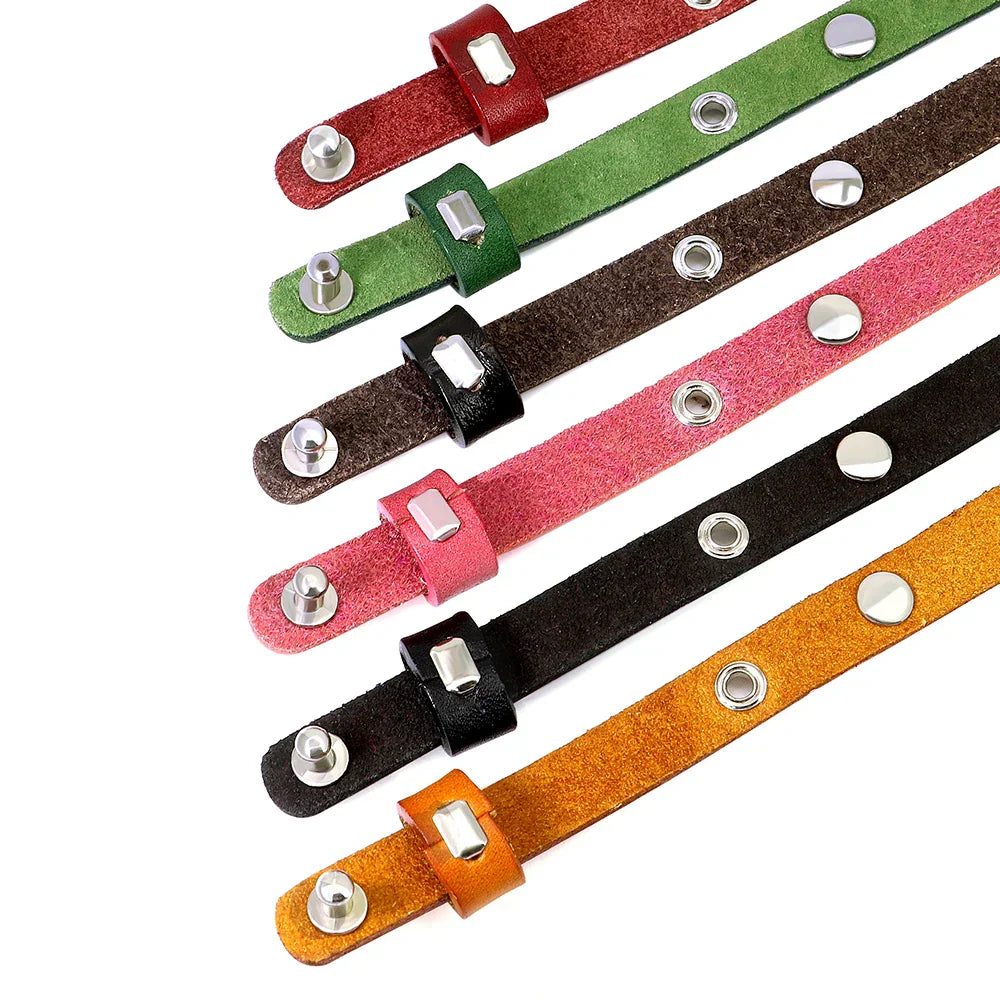 Various colorful customizable leather pet collars with metal studs and adjustable straps for cats and small dogs