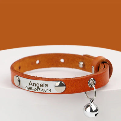 Personalized brown leather pet collar with engraved name and phone number, adjustable with bell for cats and small dogs