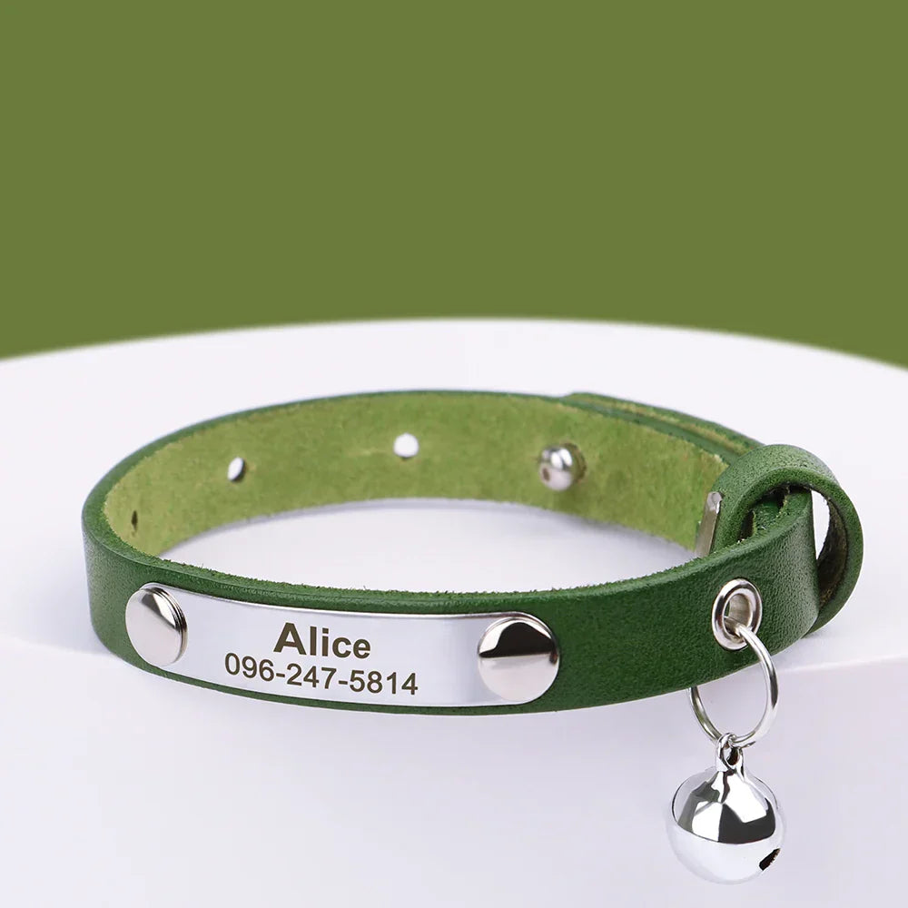 Green leather collar for pets with personalized name and phone number engraving, adjustable fit, and attached bell